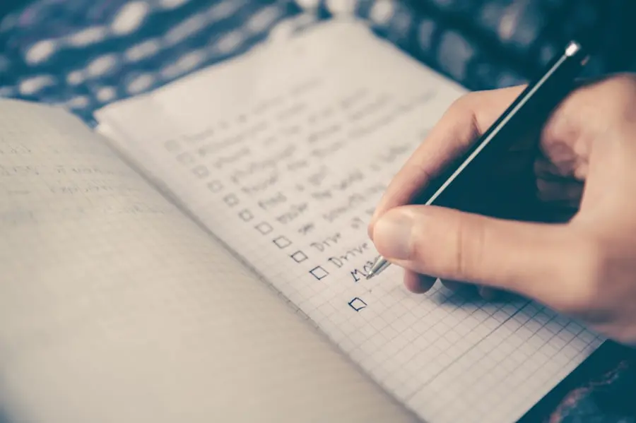 A weekly planning notebook with handwritten daily anchors